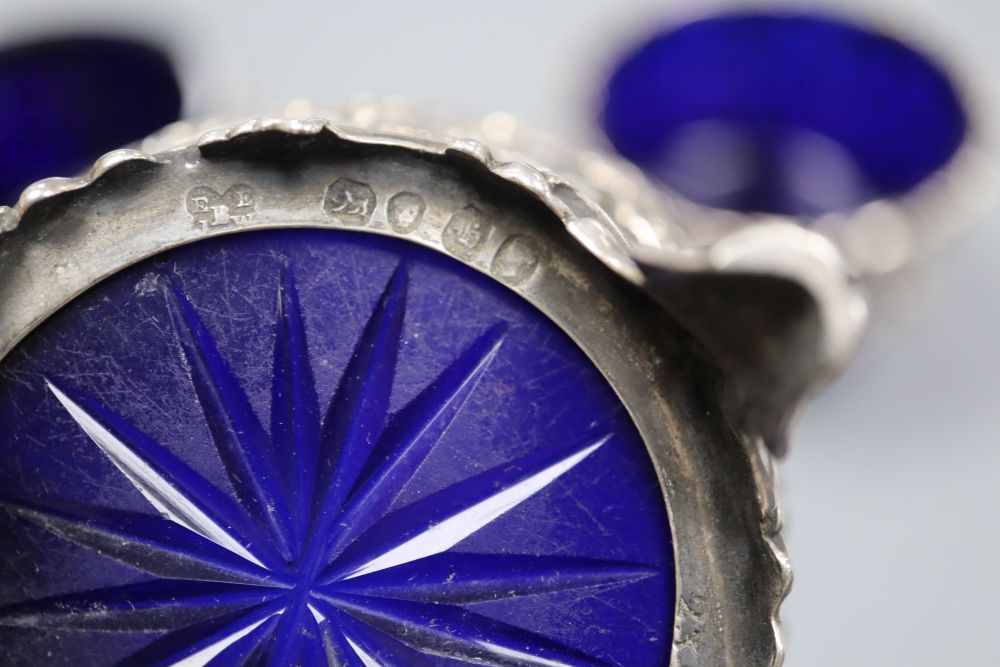A set of three early Victorian pierced silver salts by The Barnards, London,1840 and a pair, London 1843.